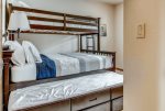 Third bedroom offers a twin-over-queen bunk bed with trundle